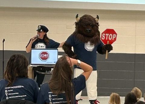 Utah Tech University Bison holding stop sign for Assembly about Online Safety