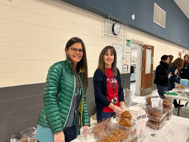 Mrs. Beard and Mrs. Sabaitis posing for Misses and Muffins
