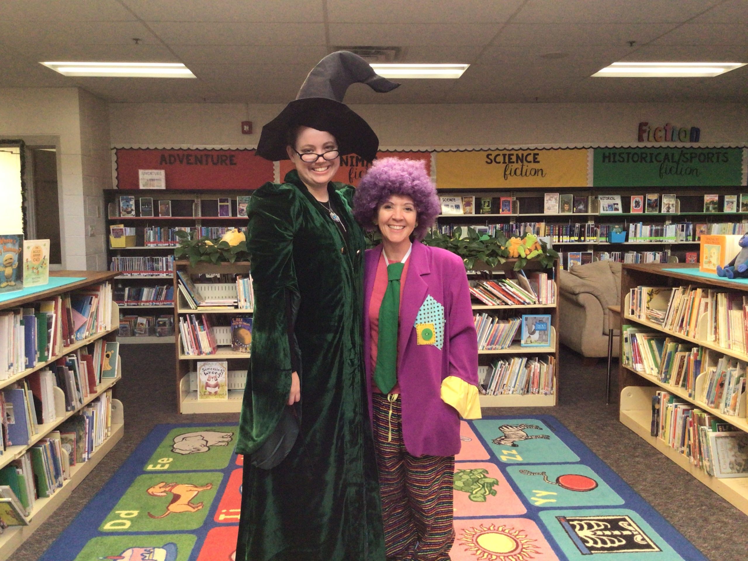 Mrs. Richey and Mrs. Evans posing in their Halloween Costumes.